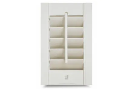 S-Craft Antigua range plantation shutters installed in bright modern living room.