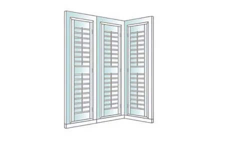 White plantation shutters installed throughout conservatory windows.