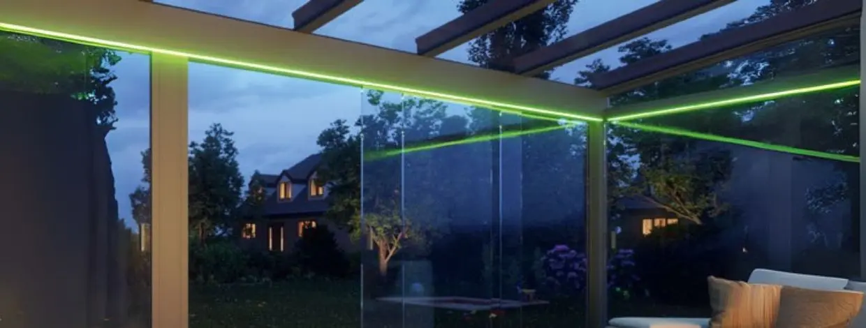 Weinor Artares pergola with atmospheric LED lighting.